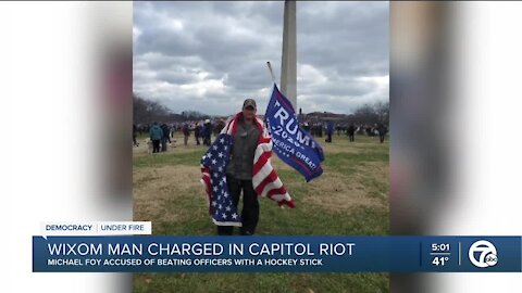 Metro Detroit man arrested for allegedly assaulting police officer with hockey stick at Capitol riot