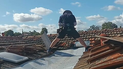 Installing a big middle valley to a tiled roof