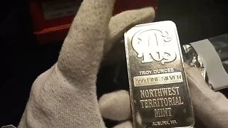 10oz silver bar added to the stack.