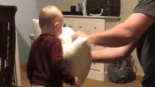 Baby loves a good pillow fight!