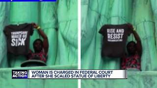 Woman climbs base of Statue of Liberty, 7 arrested