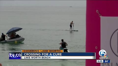 Crossing For A Cure event takes place at Lake Worth Beach