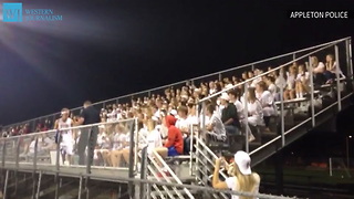 Police Officer Leads Comical Chant At Football Game