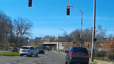 Dash cam captures back-to-back red light runners