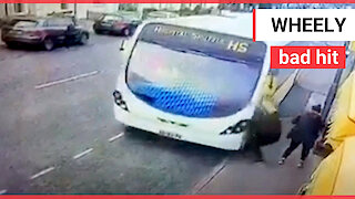 Shocking moment pedestrian gets hit by bus