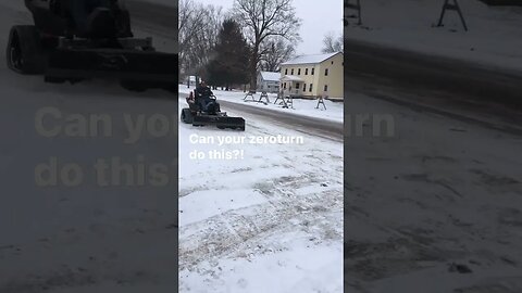 TRX766 with snow plow in action