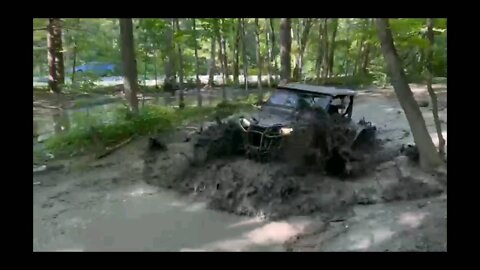 Honda Talon struggling with pretty deep mud hole