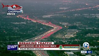 Semi wreck causing delays in southern Palm Beach County