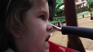 Little Girl’s First Roller Coaster Ride
