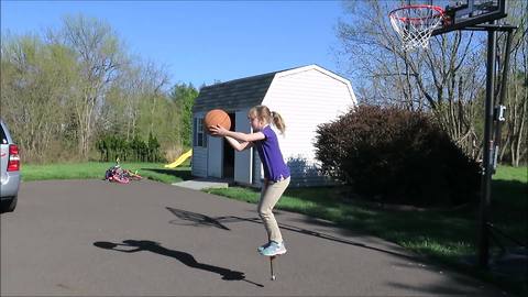 A Girl Wins At Pogo Stick Basketball