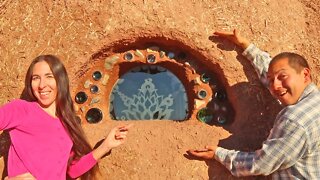 This Beautiful Window Is Made With Etched Glass and Glass Bottles