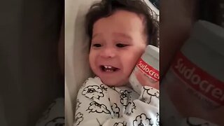 Little baby boy giggles while playing with perfume and cream #cutebaby