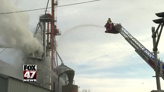 Firefighters responding to fire at agricultural business