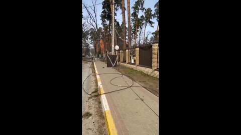 Ukrainian forces walk through devastated neighborhoods in Irpin Ukraine