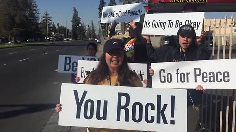 Bakersfield High students took to the streets to spread positive messages on Tuesday