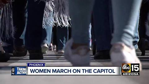 Women march on the capitol in Phoenix