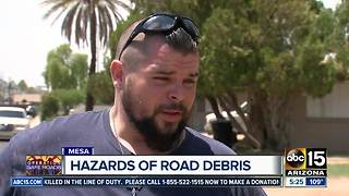 Motorcyclist hurt while dodging road debris