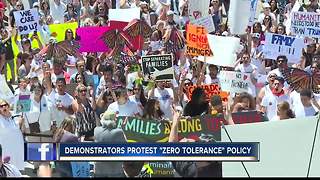 Hundreds march on Idaho State Capitol for "Families Belong Together" rally.