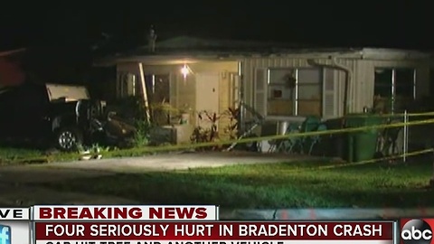 Car crashes into tree, bursts into flames in front of Bradenton home, four transported to hospital