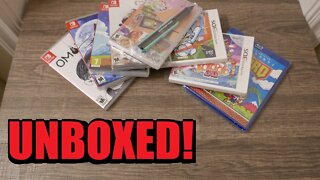 Unboxing a BUNCH of games and stuff!