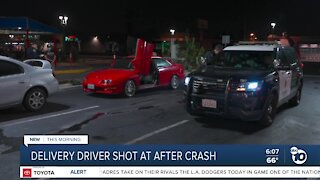 Delivery driver shot at after crash in Corridor area