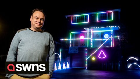 Xmas-mad barrister spends £5K creating a light and music display which drivers tune into