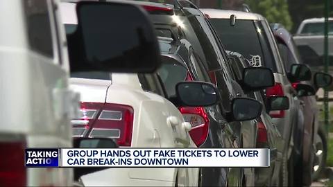 Fake parking tickets at the Tigers game to serve as a warning for theft