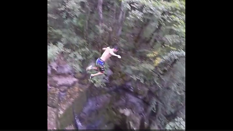 Brave Daredevil Jumps Nearly 50 Feet Into Water Pit