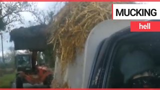Tractor driver chases hunt saboteurs and tips manure over their van