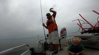 Summer crappie, crappie fishing, dodging storms, father and son fishing for crappie.
