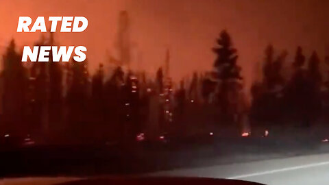 Dramatic Footage of Drive Through Wildfire as Evacuations Sweep Western Canada