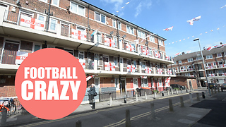 London street is urging on the England team in the World Cup with display of the national flag
