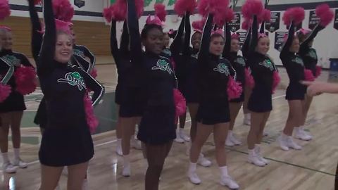 Friday Football Frenzy: Cathedral High School cheerleaders and students ready for game against Center Grove