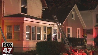 Home suffers minor damage after overnight fire in Lansing