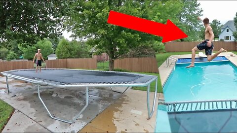 WORLD'S BIGGEST TRAMPOLINE INTO BACKYARD POOL!