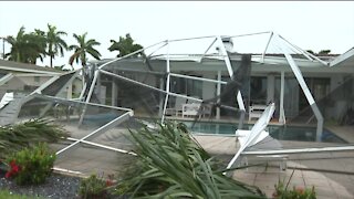 High winds overnight in Cape Coral brought down a pool cage behind a vacation rental