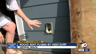 Rocks sent flying by high surf in Imperial Beach