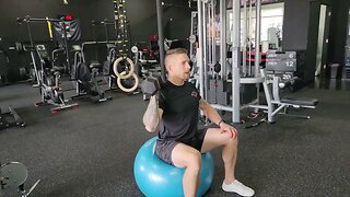 Swiss Ball Dumbbell Single Arm Shoulder Press