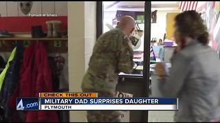 Military dad surprises daughter at school