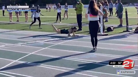 Oregon high school junior falls face-first at finish line as mask restricts Breathing