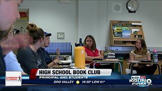 Principal, high school students gather for book club