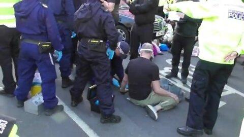 Another protester glued his hand to the road in marble arch