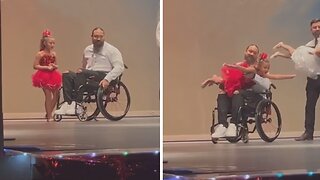 Dad's love shines as he dances with his daughter from a wheelchair