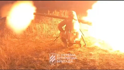 Ukrainian soldiers fire at Russian positions with rocket launchers and heavy machine guns