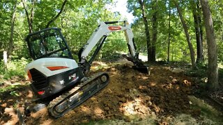 Fast Forward Friday! Time lapse videos building remote campsite with mini excavator