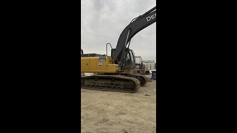 Loading a John Deere 210G