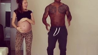 Pregnant Couple Dance With Their Baby