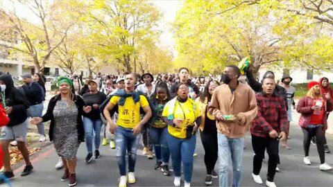 Stellenbosch University student protesting against Racism after Racism incident on campus