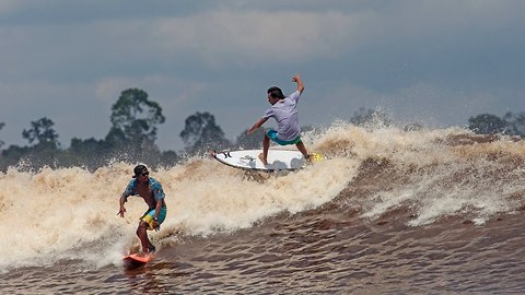 Surfer's Paradise! 30 Mile Waves Hit River In Indonesia