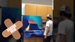Man Paints Beautiful Picture Whilst Spinning Basketball On Brush - DoctorViral